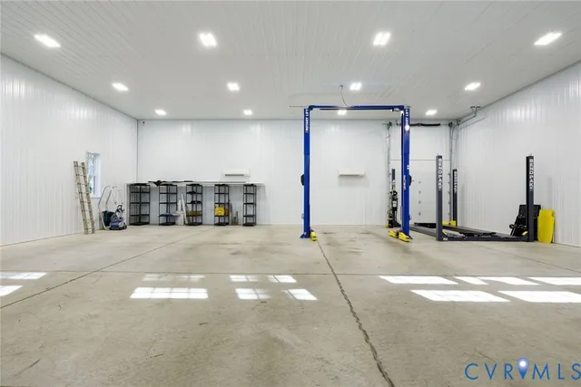 a view of a hall with gym equipment