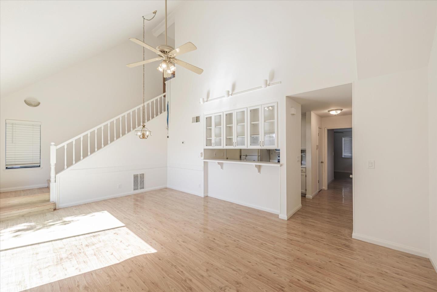 720 Natalie Drive Morgan Hill, CA 95037 - Photo 7 of 35 a view of a hallway with wooden floor and staircase