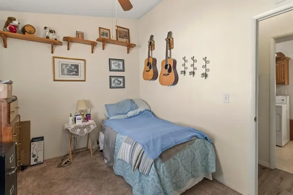 a bedroom with a bed and furniture