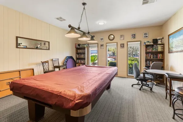 a bed room with a bed and a desk