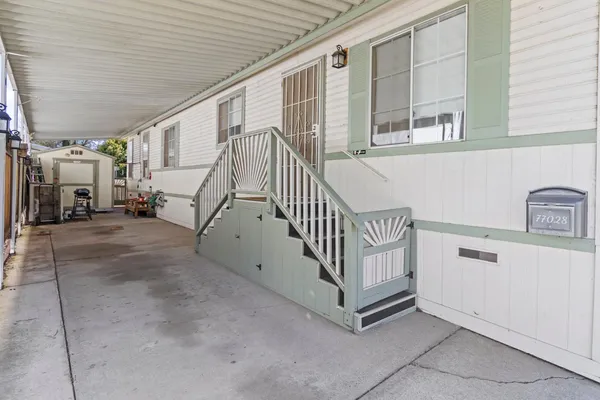 a view of a hallway with windows