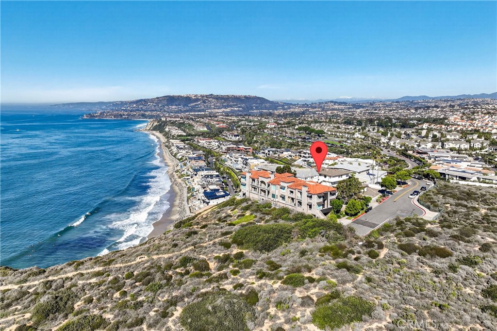 34381 Dana Strand Road, Unit 2 Dana Point, CA 92629 - Photo 14 of 42 an aerial view of a houses with a yard