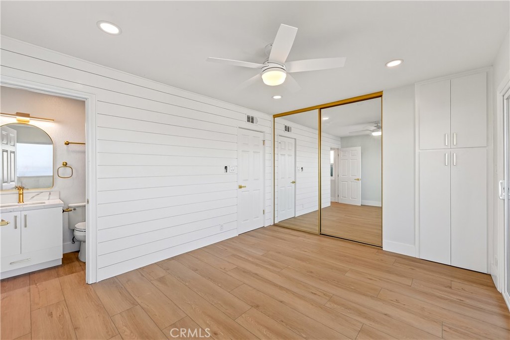 34381 Dana Strand Road, Unit 2 Dana Point, CA 92629 - Photo 21 of 42 a view of empty room with wooden floor