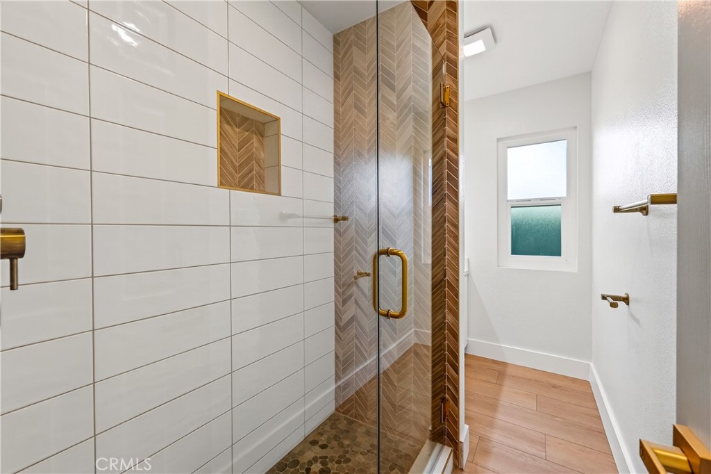 34381 Dana Strand Road, Unit 2 Dana Point, CA 92629 - Photo 25 of 42 a bathroom with a shower