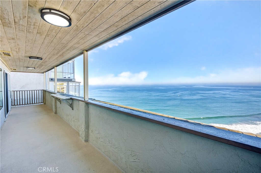 34381 Dana Strand Road, Unit 2 Dana Point, CA 92629 - Photo 33 of 42 a view of a room with wooden floor