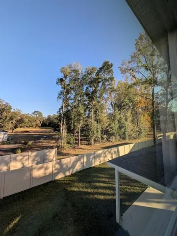 a view of a balcony with an ocean view