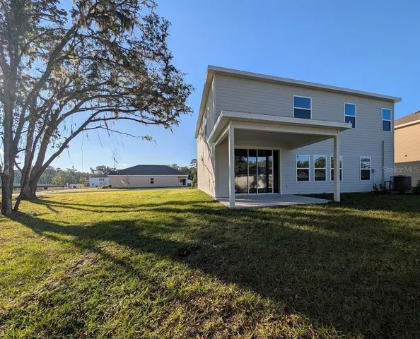 a view of a house with a big yard