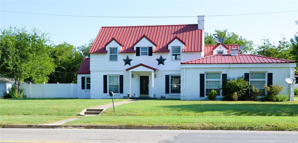 a view of a house with a swimming pool