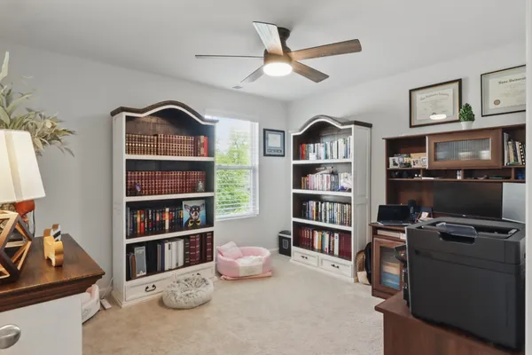 a workspace with a bookshelf