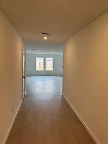 a view of hallway with window