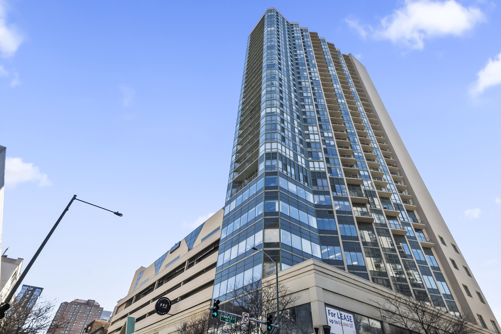 111 West Maple Street, Unit 1110 Chicago, IL 60610 - Photo 1 of 23 a view of a tall building