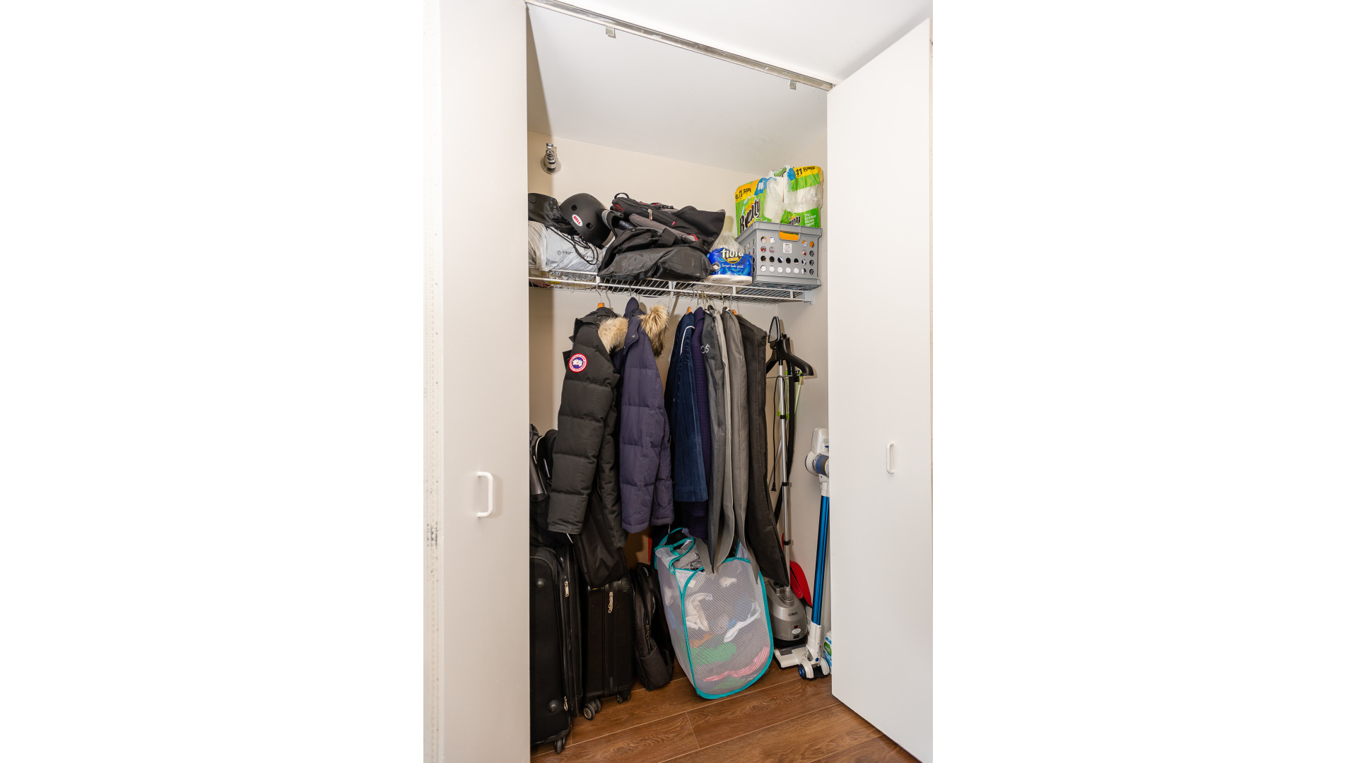 111 West Maple Street, Unit 1110 Chicago, IL 60610 - Photo 19 of 23 a view of a hallway with two black cars