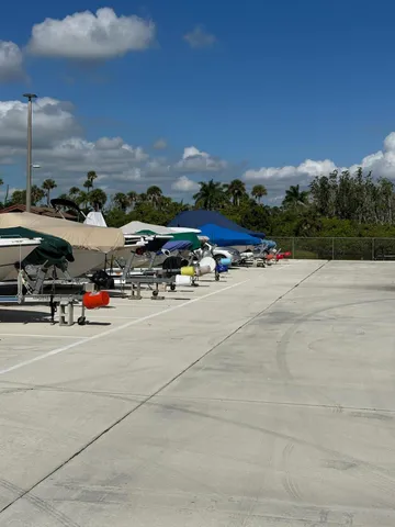 a view of a garden with an outdoor seating