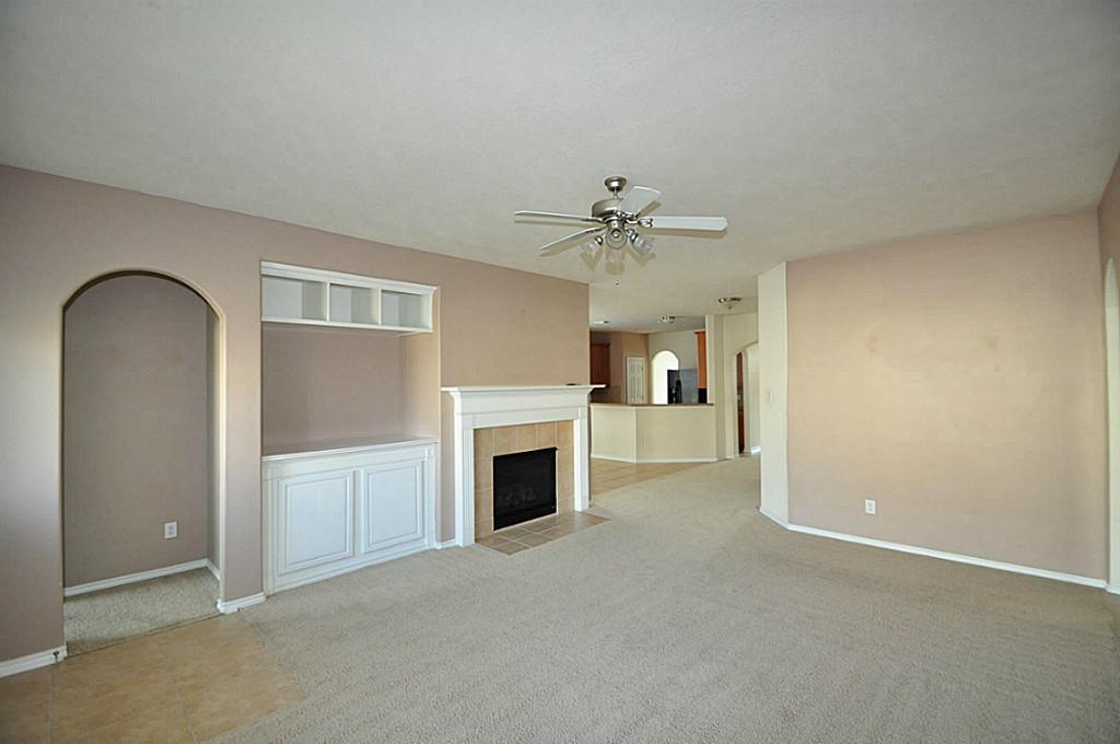 12315 Field Brook Court Houston, TX 77089 - Photo 17 of 28 a view of empty room with a fireplace