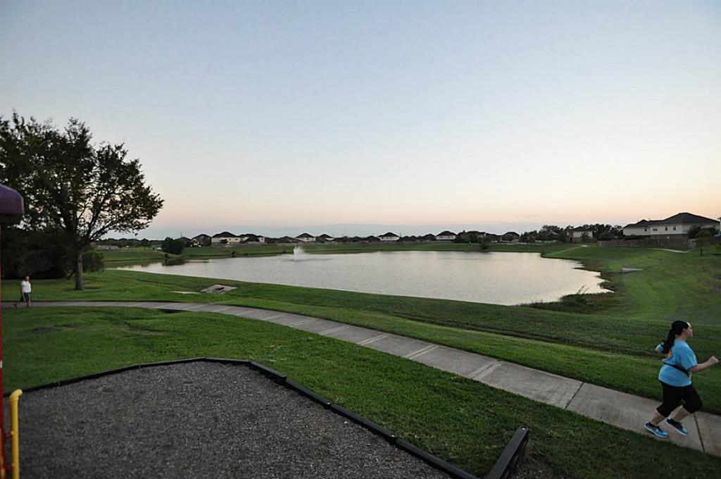 12315 Field Brook Court Houston, TX 77089 - Photo 22 of 28 a view of a lake with a big yard