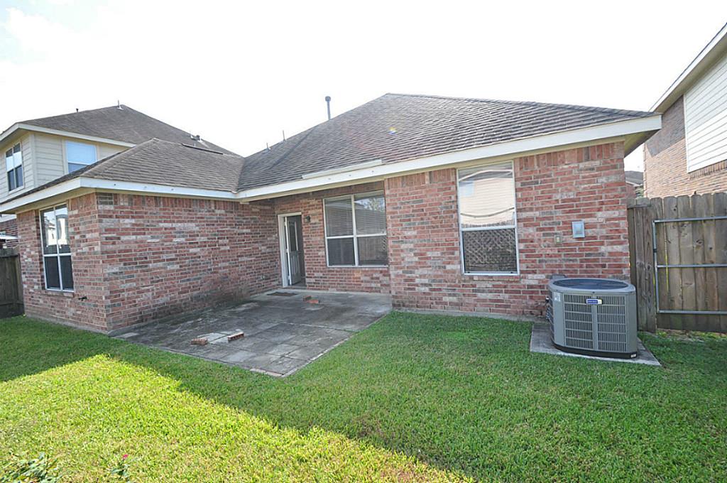 12315 Field Brook Court Houston, TX 77089 - Photo 28 of 28 a view of front of a house with a yard