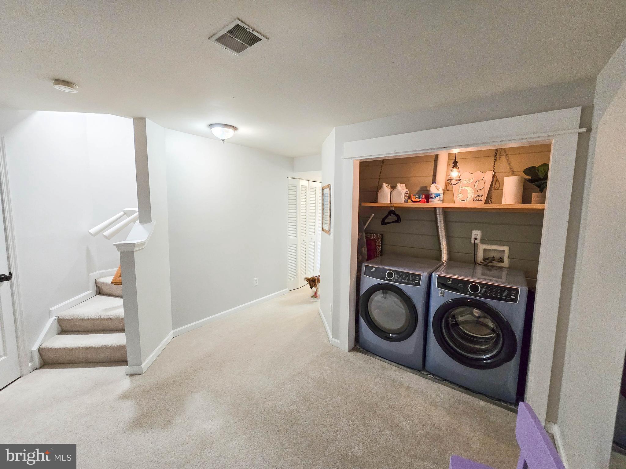 6771 Stone Maple Terrace Centreville, VA 20121 - Photo 23 of 33 a view of washer and dryer