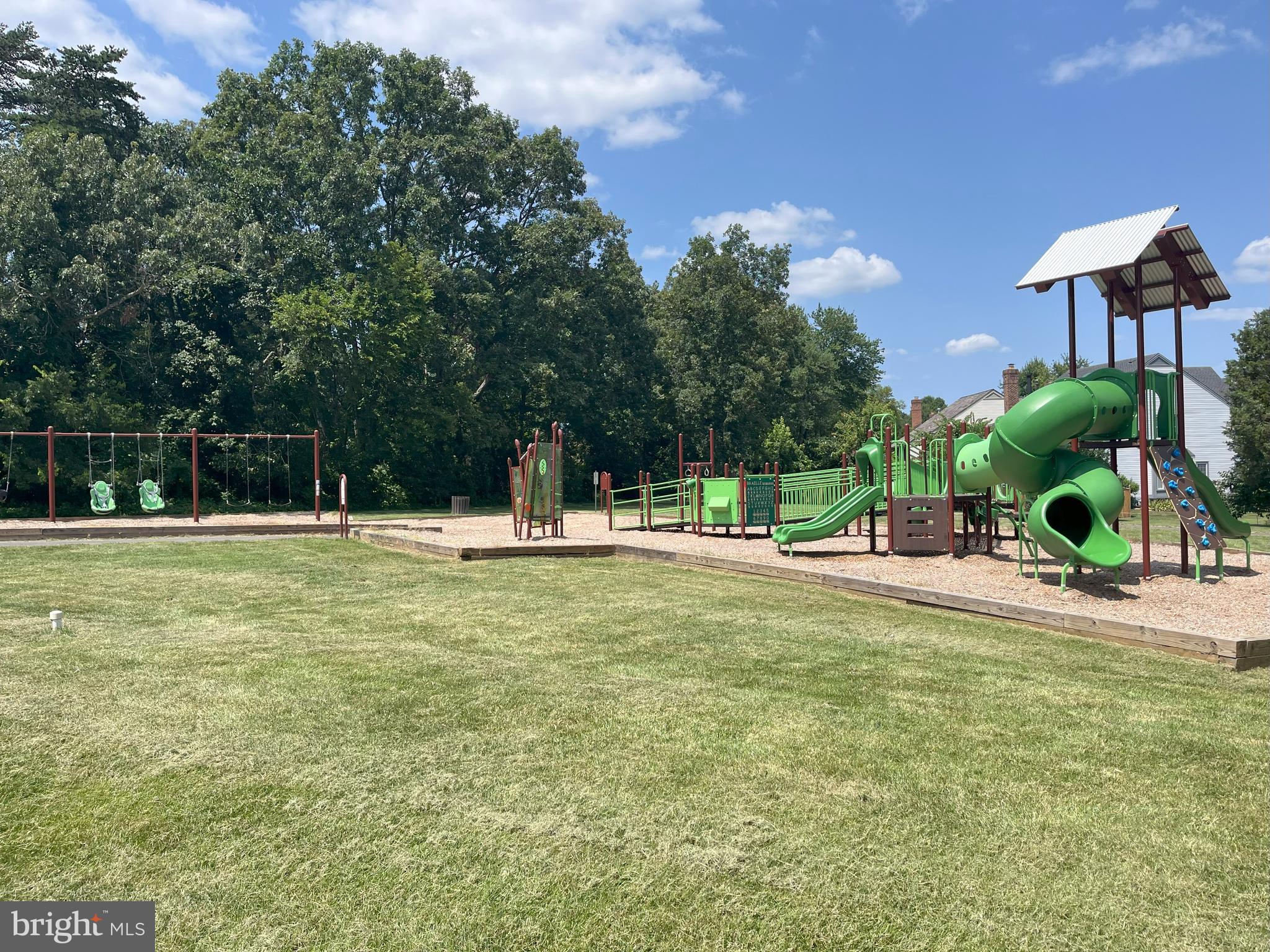 6771 Stone Maple Terrace Centreville, VA 20121 - Photo 32 of 33 a view of a fountain in front of a house