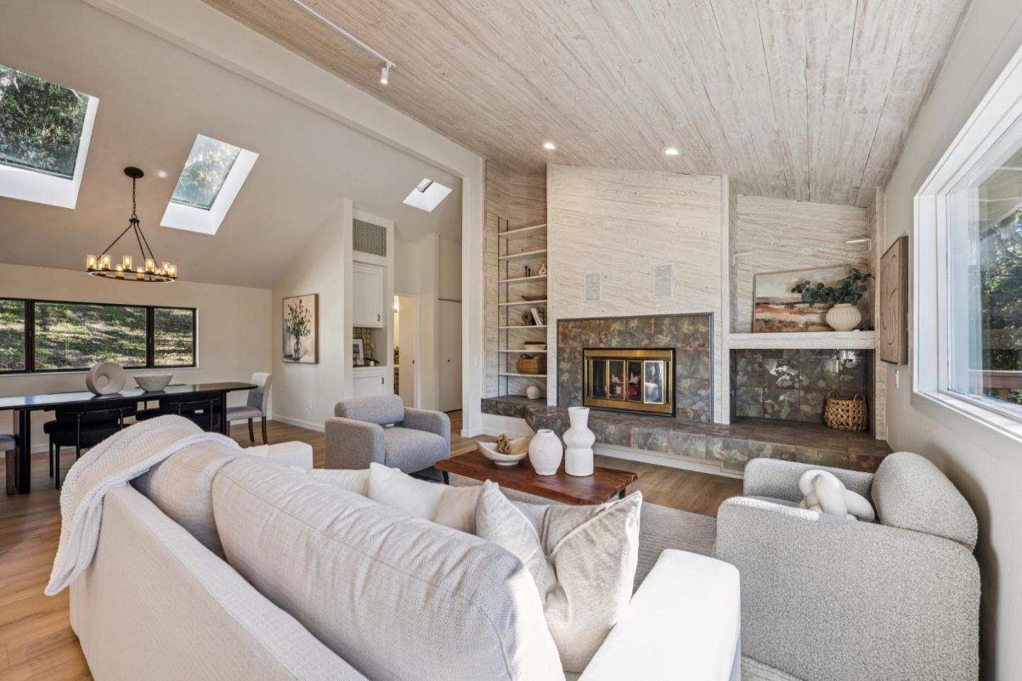 1100 Castro Road Monterey, CA 93940 - Photo 11 of 70 a living room with furniture fireplace and a large window