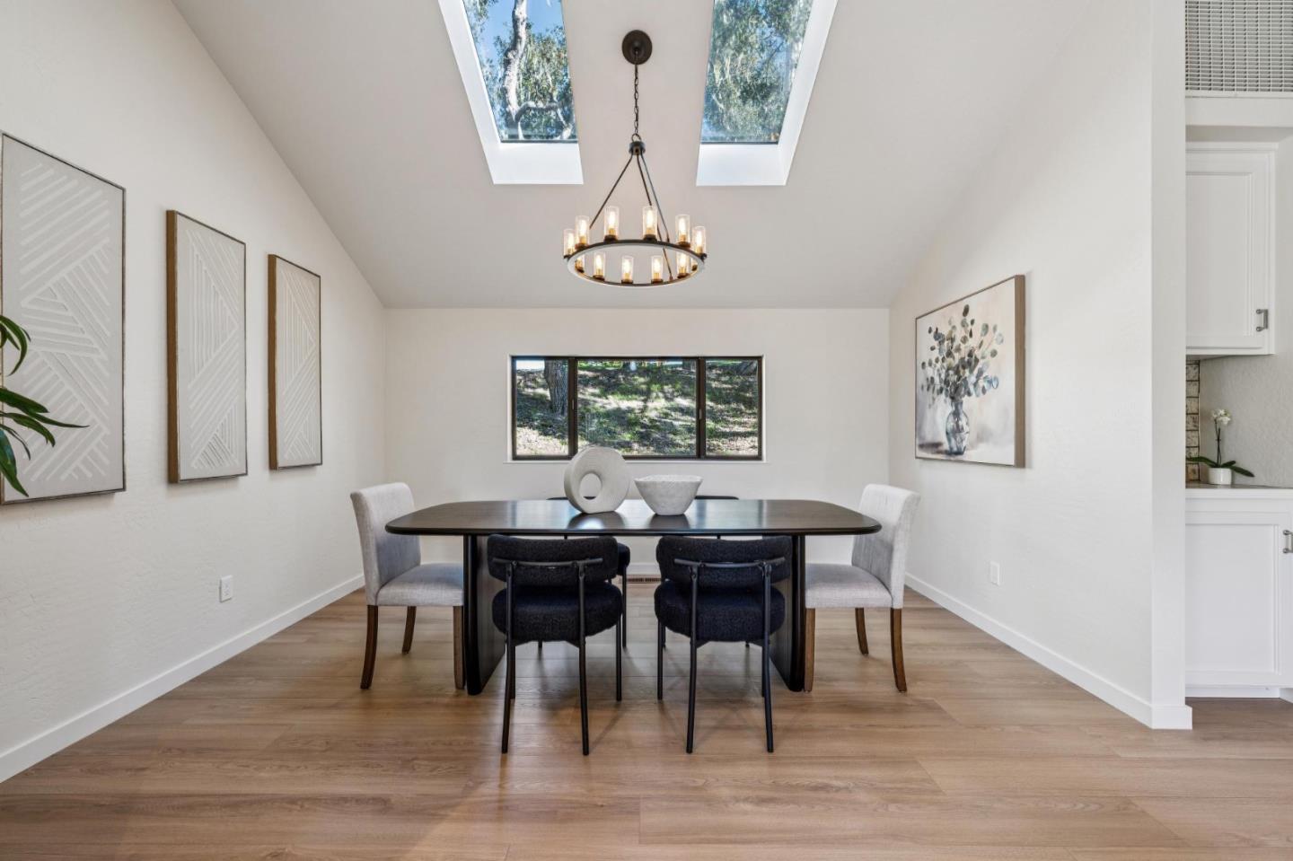 1100 Castro Road Monterey, CA 93940 - Photo 19 of 70 a view of a dining room with furniture window and wooden floor