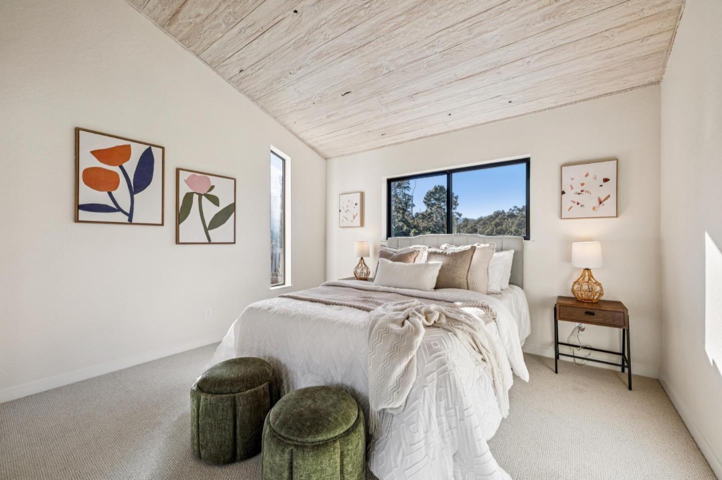 1100 Castro Road Monterey, CA 93940 - Photo 47 of 70 a bed room with a bed and painting on the wall