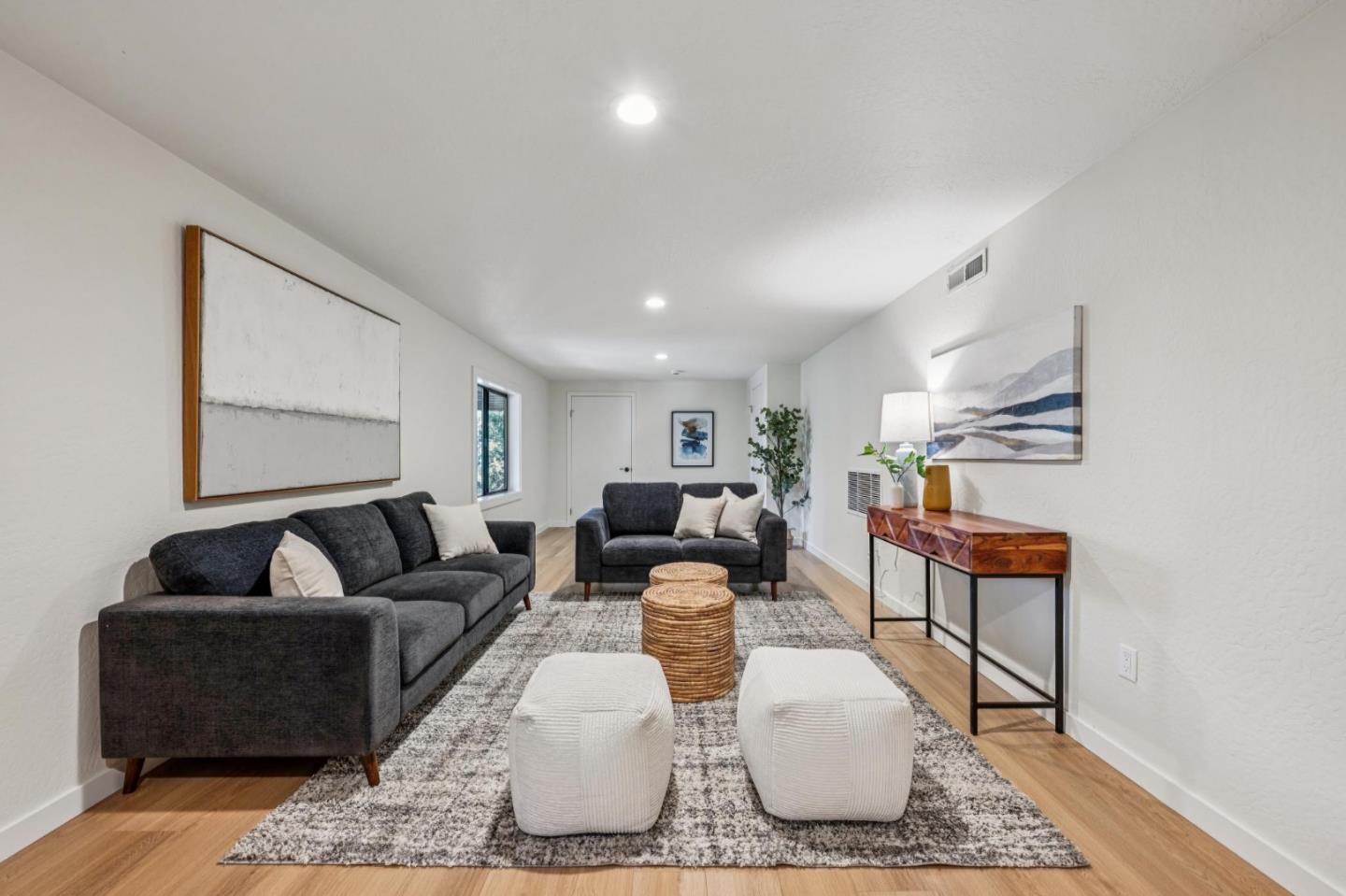1100 Castro Road Monterey, CA 93940 - Photo 51 of 70 a living room with furniture and wooden floor