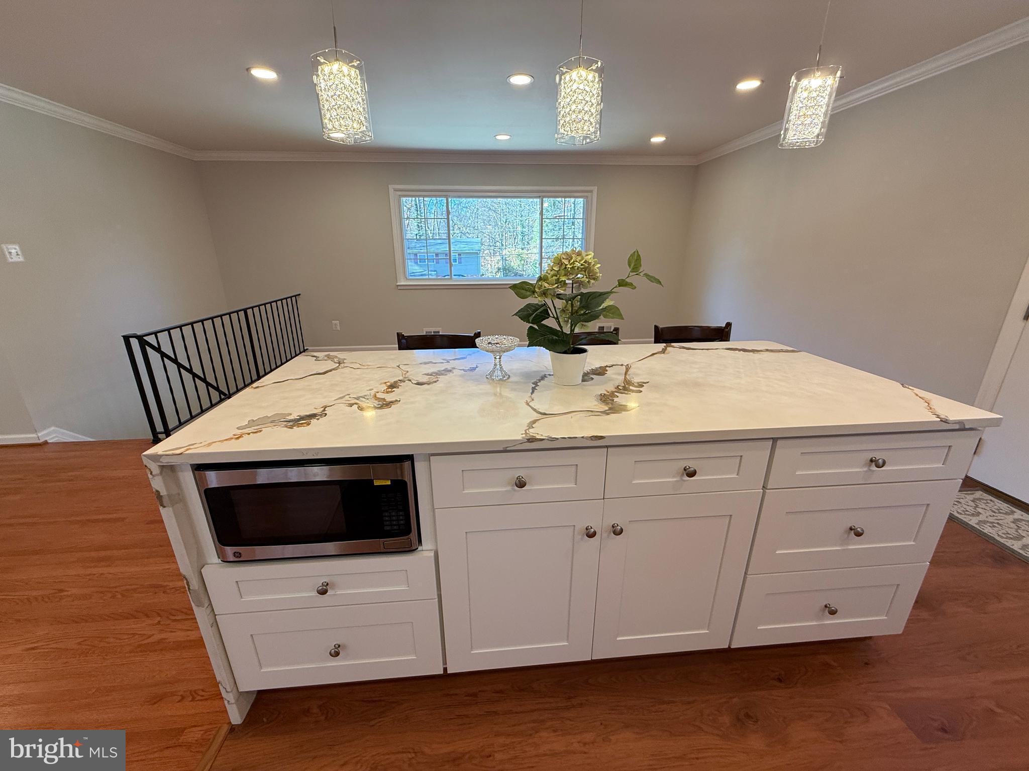 4721 Springbrook Drive Annandale, VA 22003 - Photo 20 of 69 a bathroom with a sink a large mirror and vanity