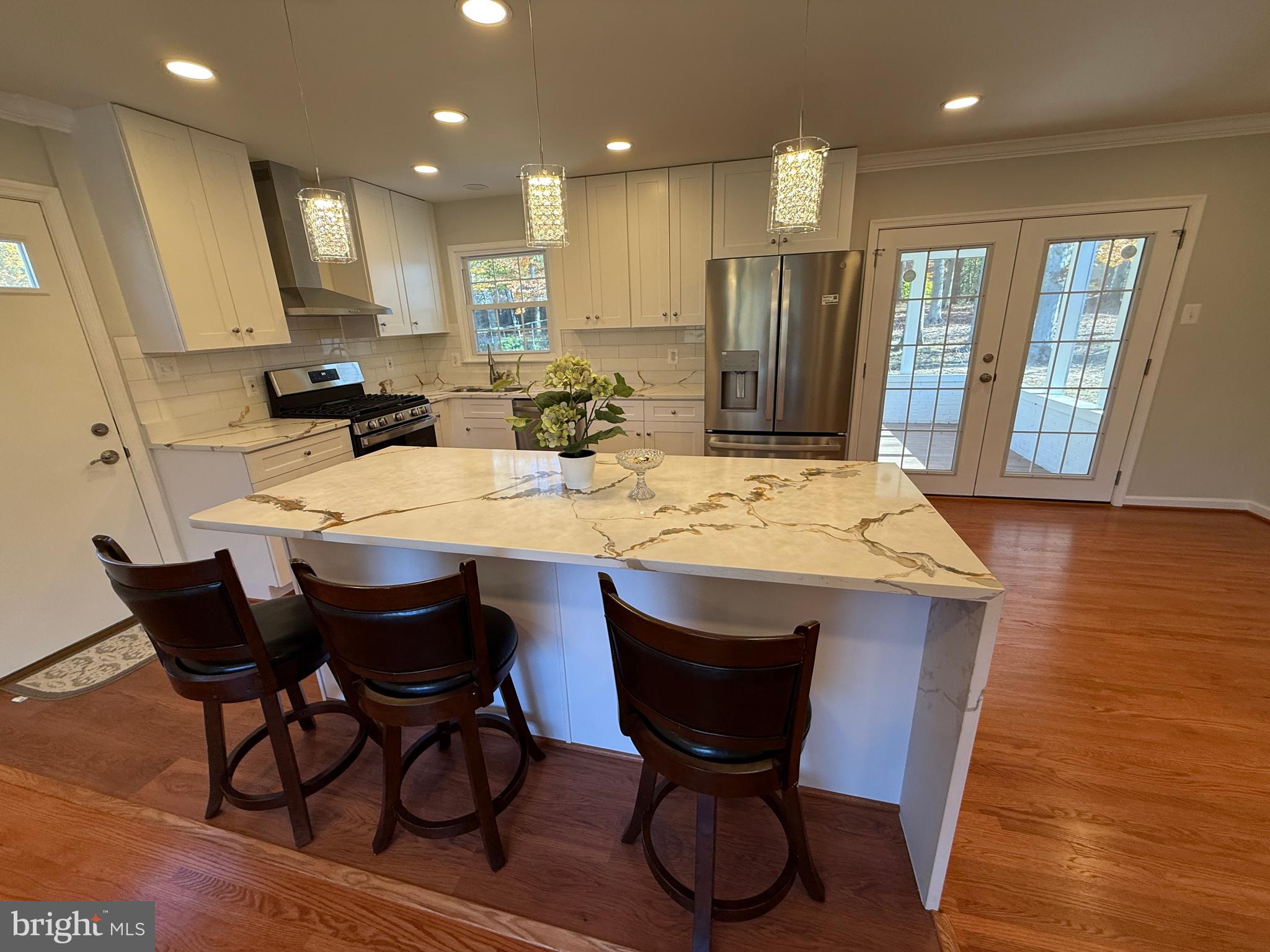 4721 Springbrook Drive Annandale, VA 22003 - Photo 28 of 69 a large kitchen with a table and chairs