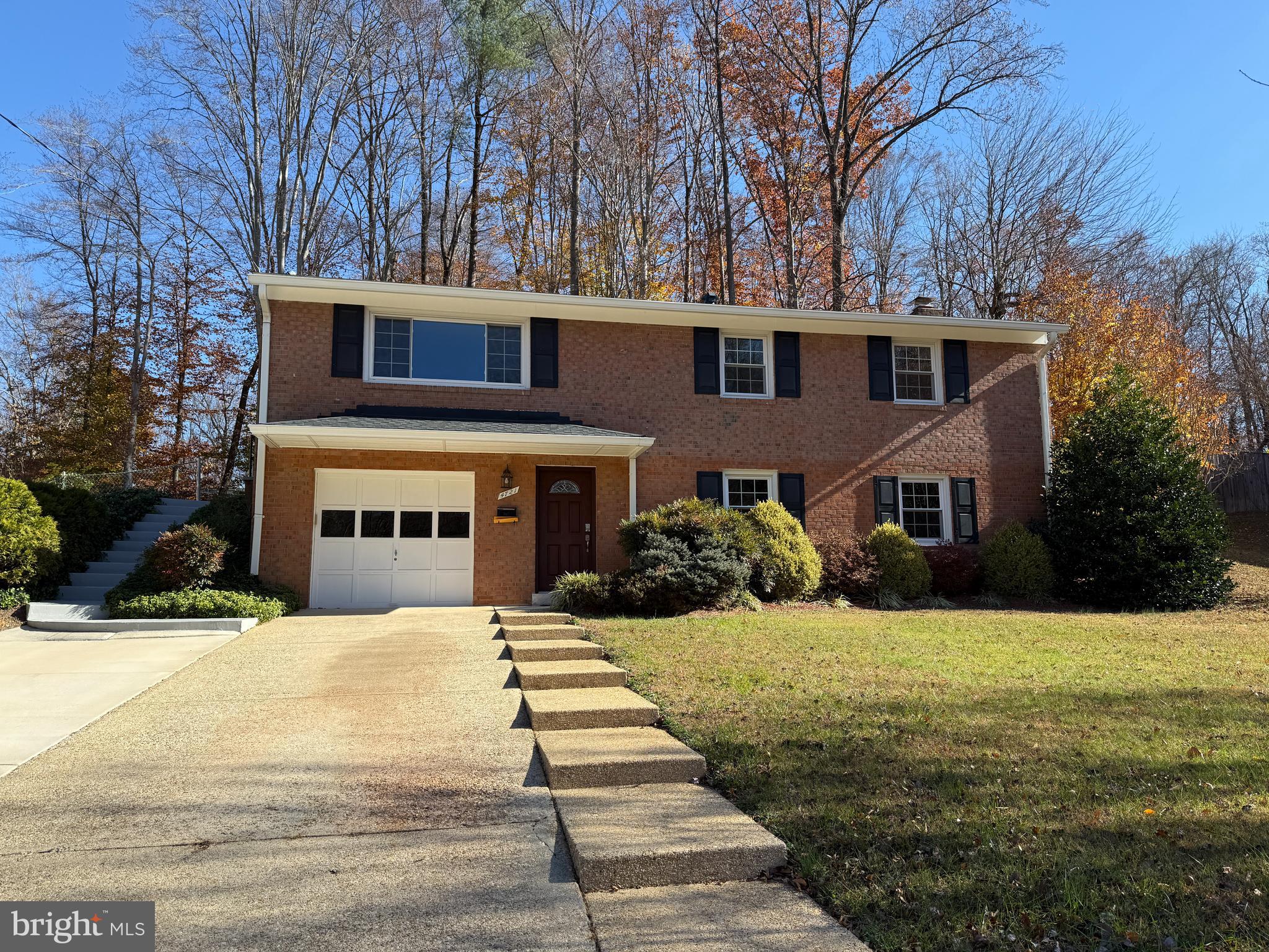 4721 Springbrook Drive Annandale, VA 22003 - Photo 3 of 69 a front view of a house with yard and trees