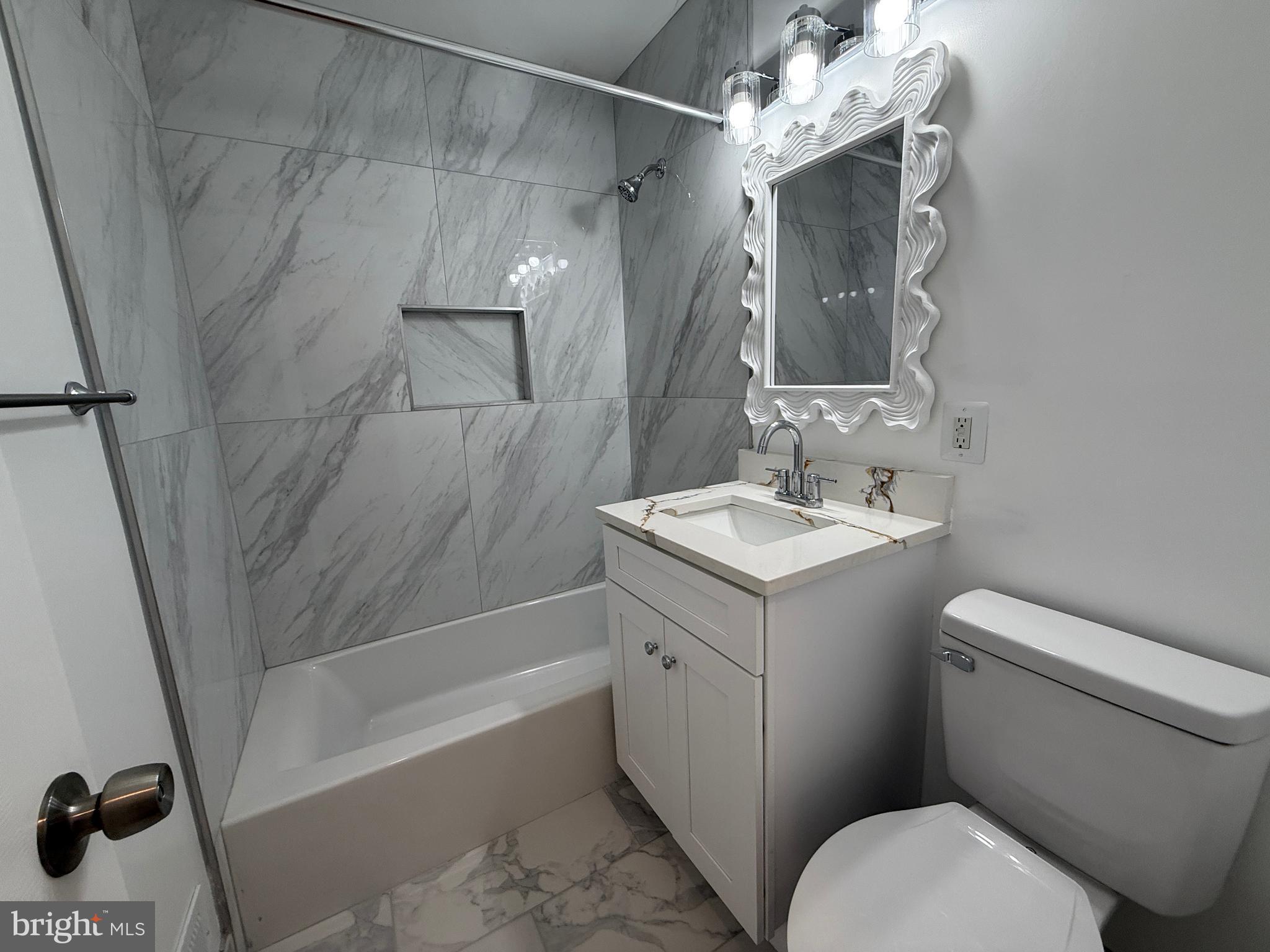 4721 Springbrook Drive Annandale, VA 22003 - Photo 42 of 69 a bathroom with a sink toilet and shower