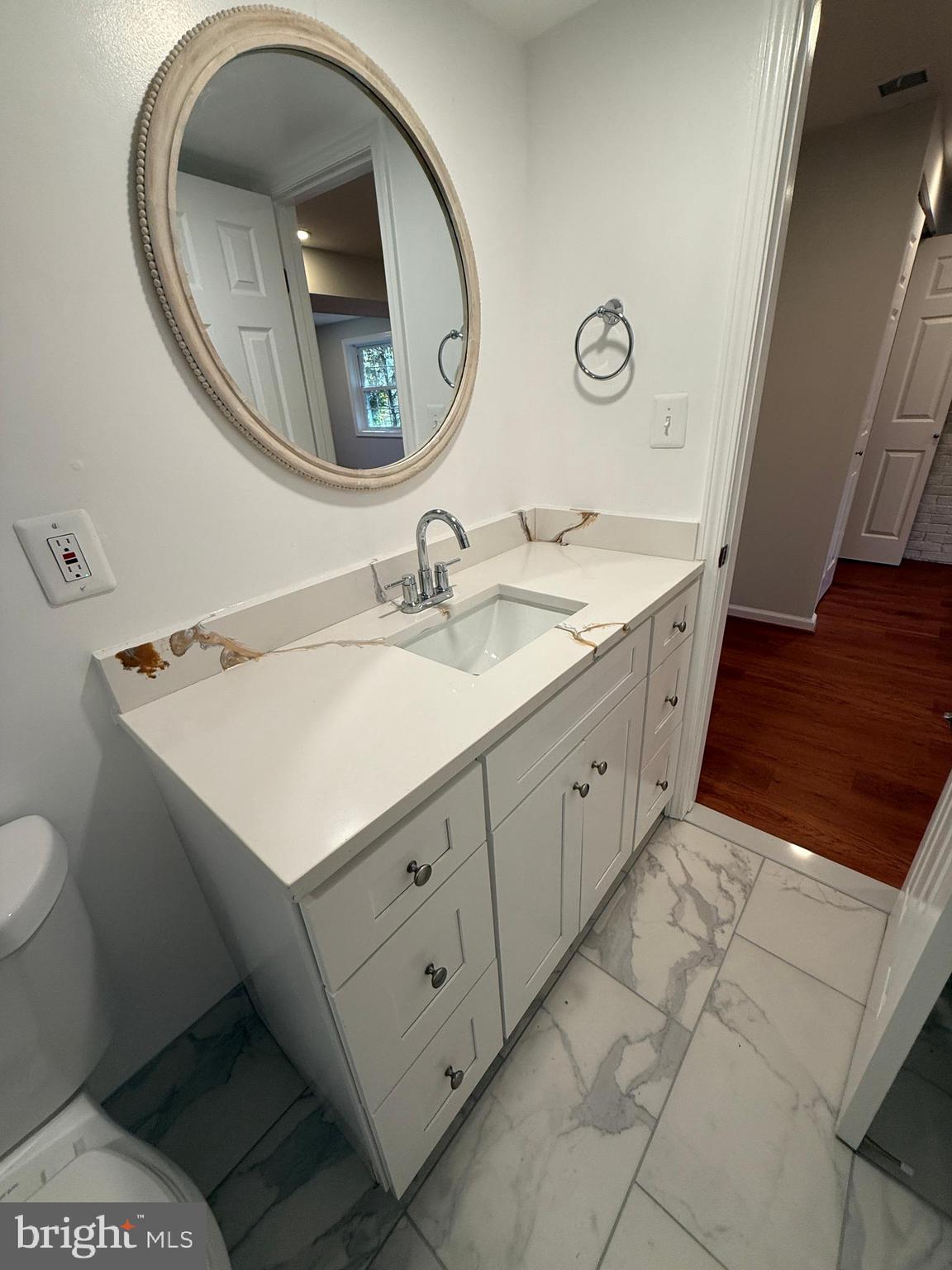 4721 Springbrook Drive Annandale, VA 22003 - Photo 44 of 69 a bathroom with a sink and a mirror