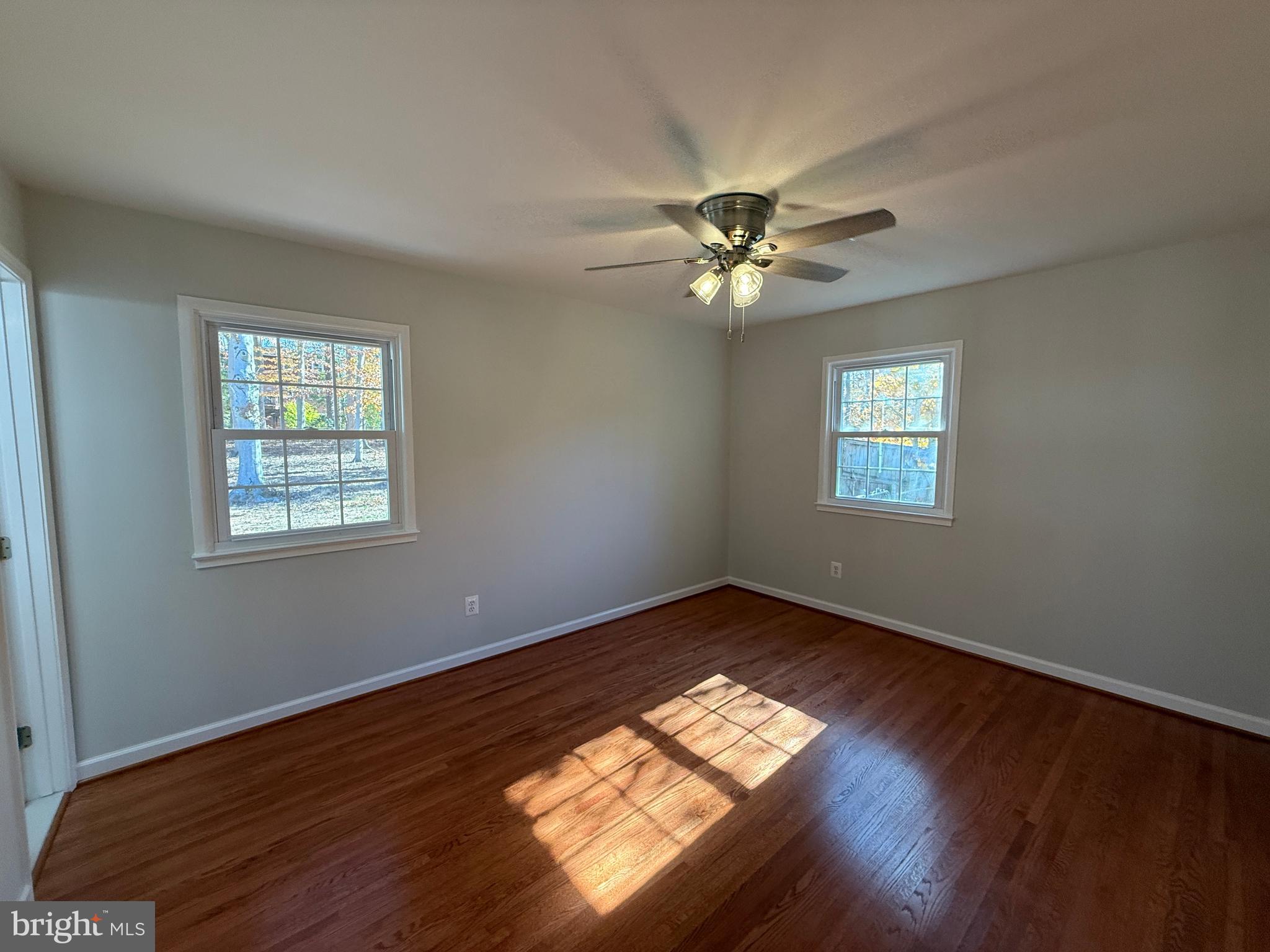 4721 Springbrook Drive Annandale, VA 22003 - Photo 54 of 69 a view of empty room with wooden floor and fan