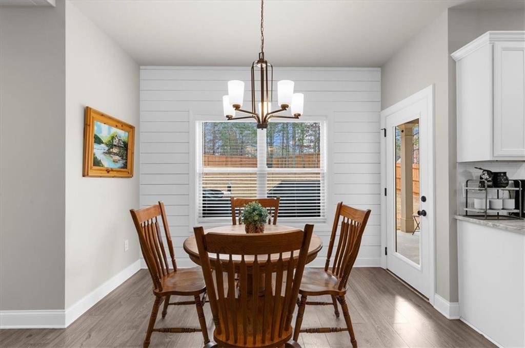 182 Bella Drive Monroe, GA 30655 - Photo 22 of 63 a dining room with furniture and window