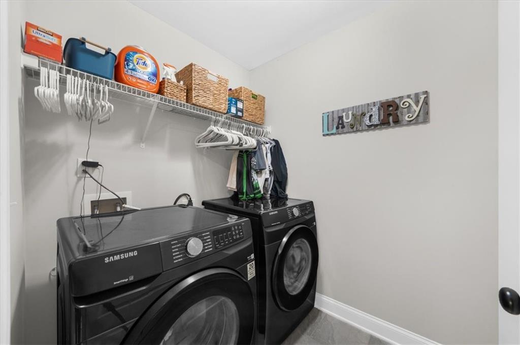 182 Bella Drive Monroe, GA 30655 - Photo 46 of 63 a utility room with dryer and washer