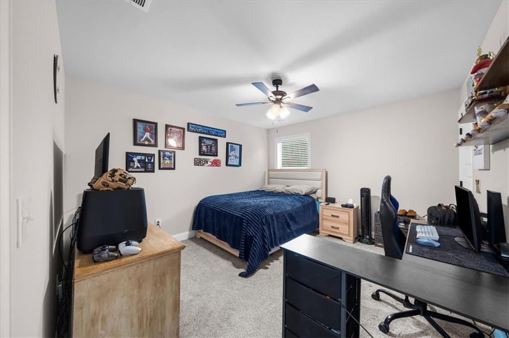 182 Bella Drive Monroe, GA 30655 - Photo 48 of 63 a living room with furniture and wooden floor