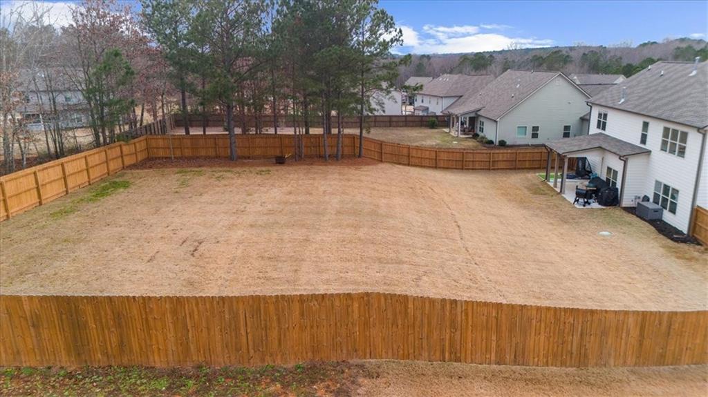 182 Bella Drive Monroe, GA 30655 - Photo 55 of 63 a view of a swimming pool with an outdoor space