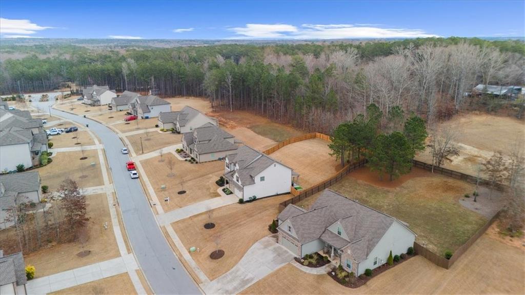 182 Bella Drive Monroe, GA 30655 - Photo 58 of 63 a view of roof deck with couch and wooden floor
