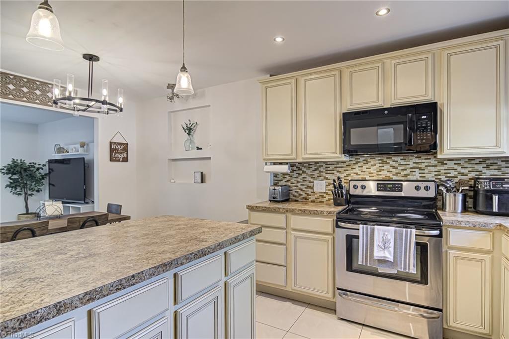 2215 Shadow Valley Road, Unit B High Point, NC 27265 - Photo 16 of 33 Alternate view of wonderful kitchen - Updated lighting fixtures!