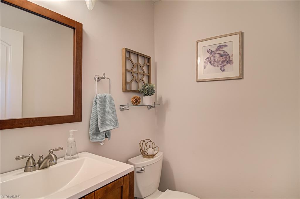 2215 Shadow Valley Road, Unit B High Point, NC 27265 - Photo 17 of 33 Half bathroom located right off the foyer