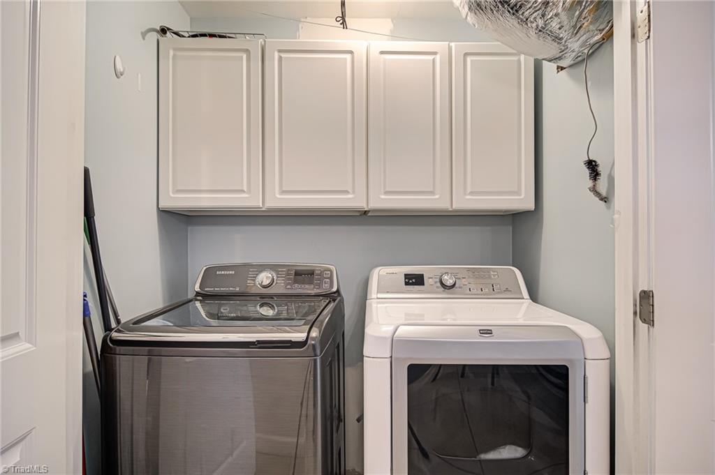 2215 Shadow Valley Road, Unit B High Point, NC 27265 - Photo 18 of 33 Laundry area is located beside the stairs - accessible from most of the living area.