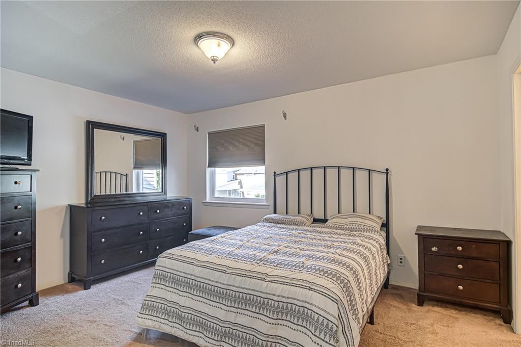 2215 Shadow Valley Road, Unit B High Point, NC 27265 - Photo 19 of 33 Primary bedroom features large closet and en suite full bathroom!