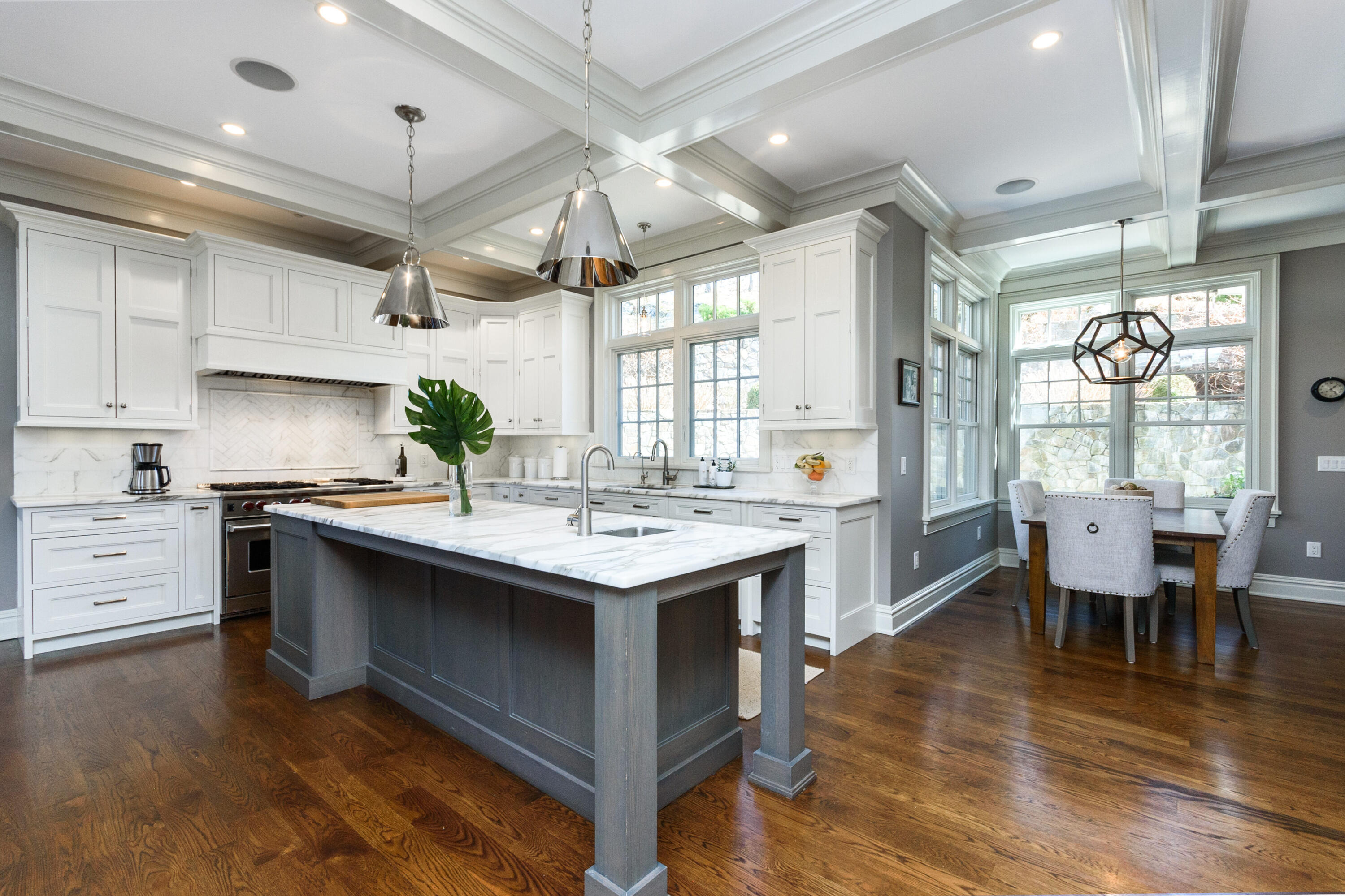 80 Goodwives River Road Darien, CT 06820 - Photo 14 of 57 a kitchen with a sink stove and wooden cabinets