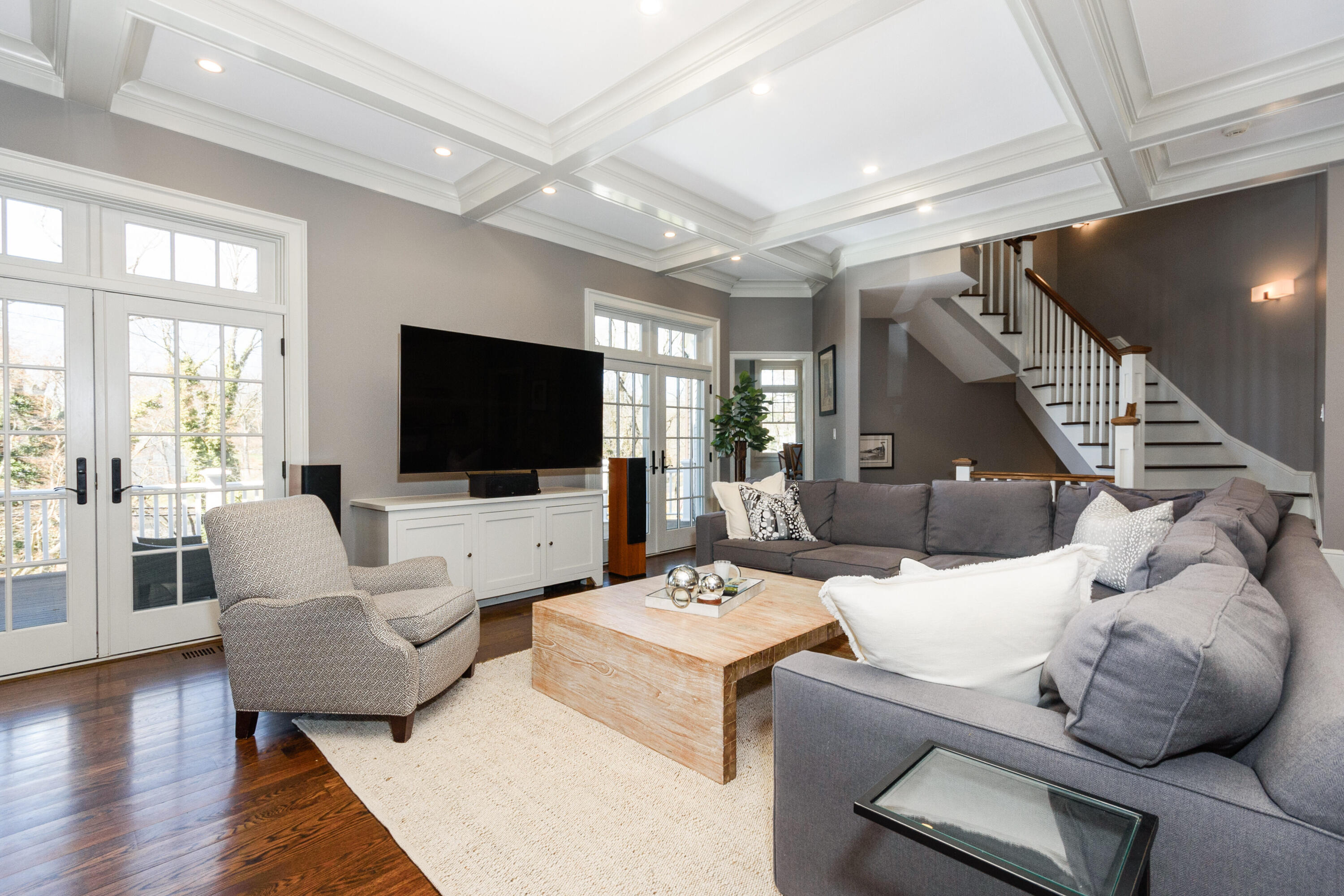 80 Goodwives River Road Darien, CT 06820 - Photo 22 of 57 a living room with furniture and a flat screen tv