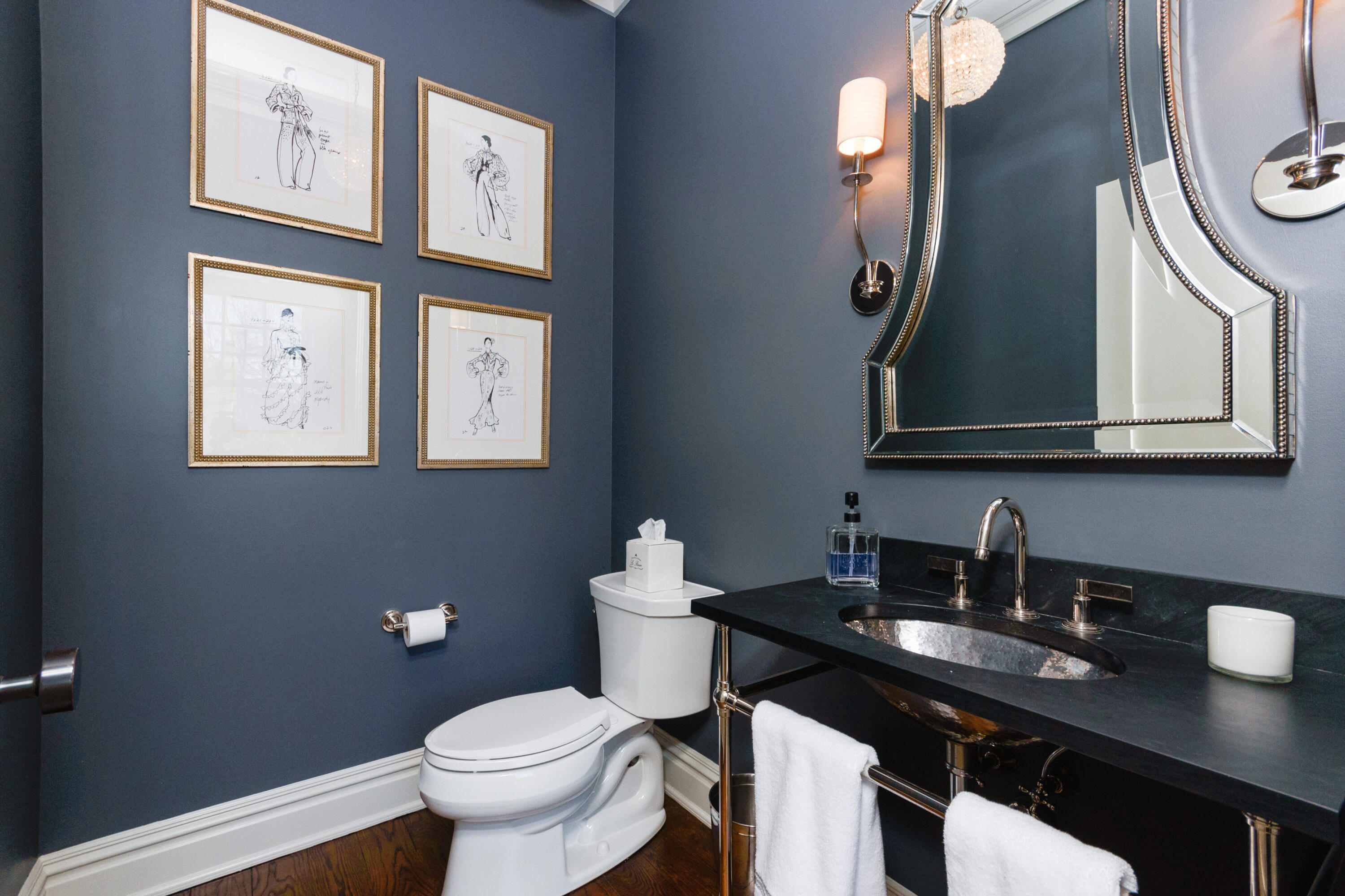 80 Goodwives River Road Darien, CT 06820 - Photo 25 of 57 a bathroom with a toilet sink and mirror