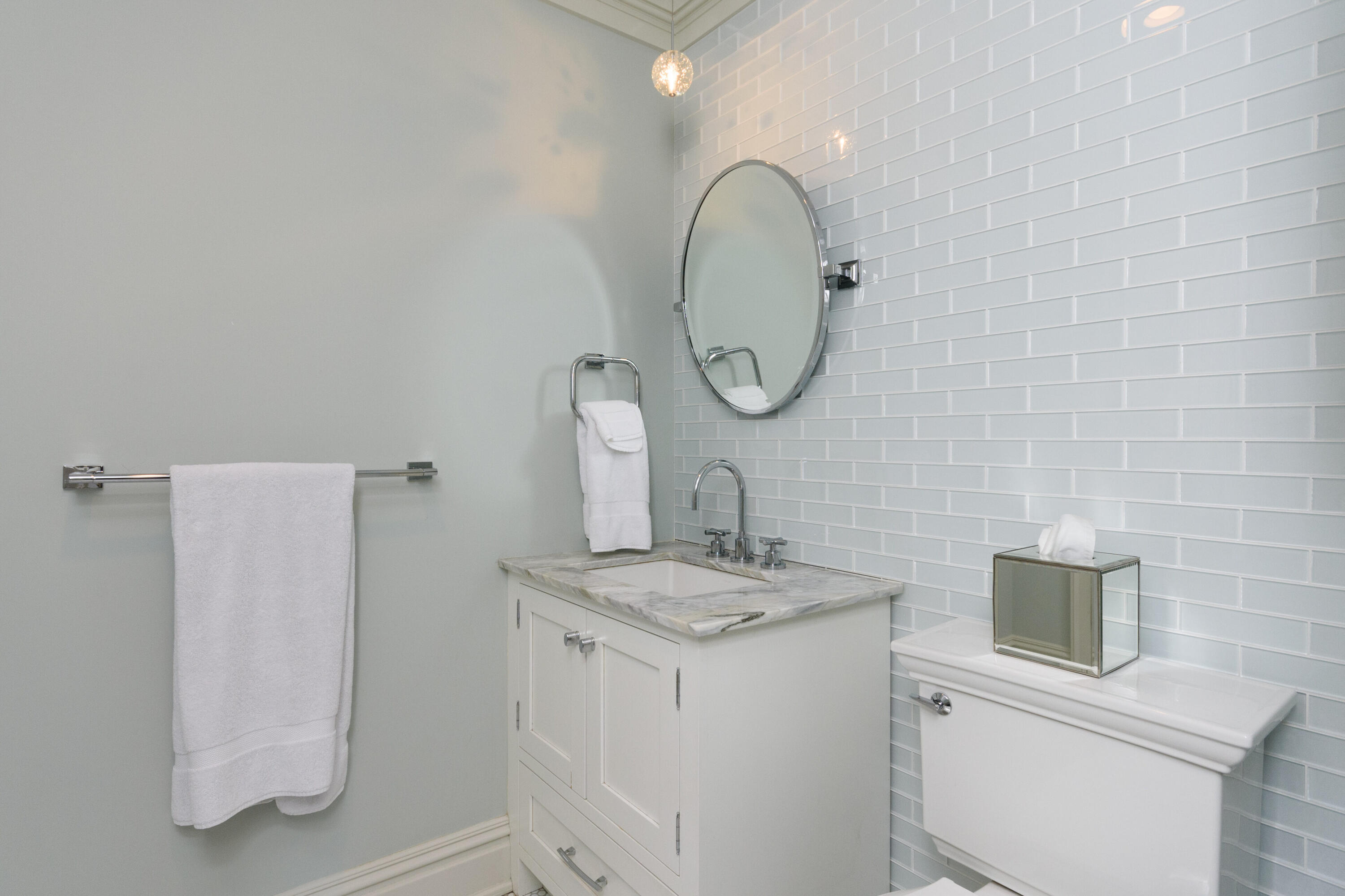 80 Goodwives River Road Darien, CT 06820 - Photo 35 of 57 a bathroom with a granite countertop toilet sink and mirror