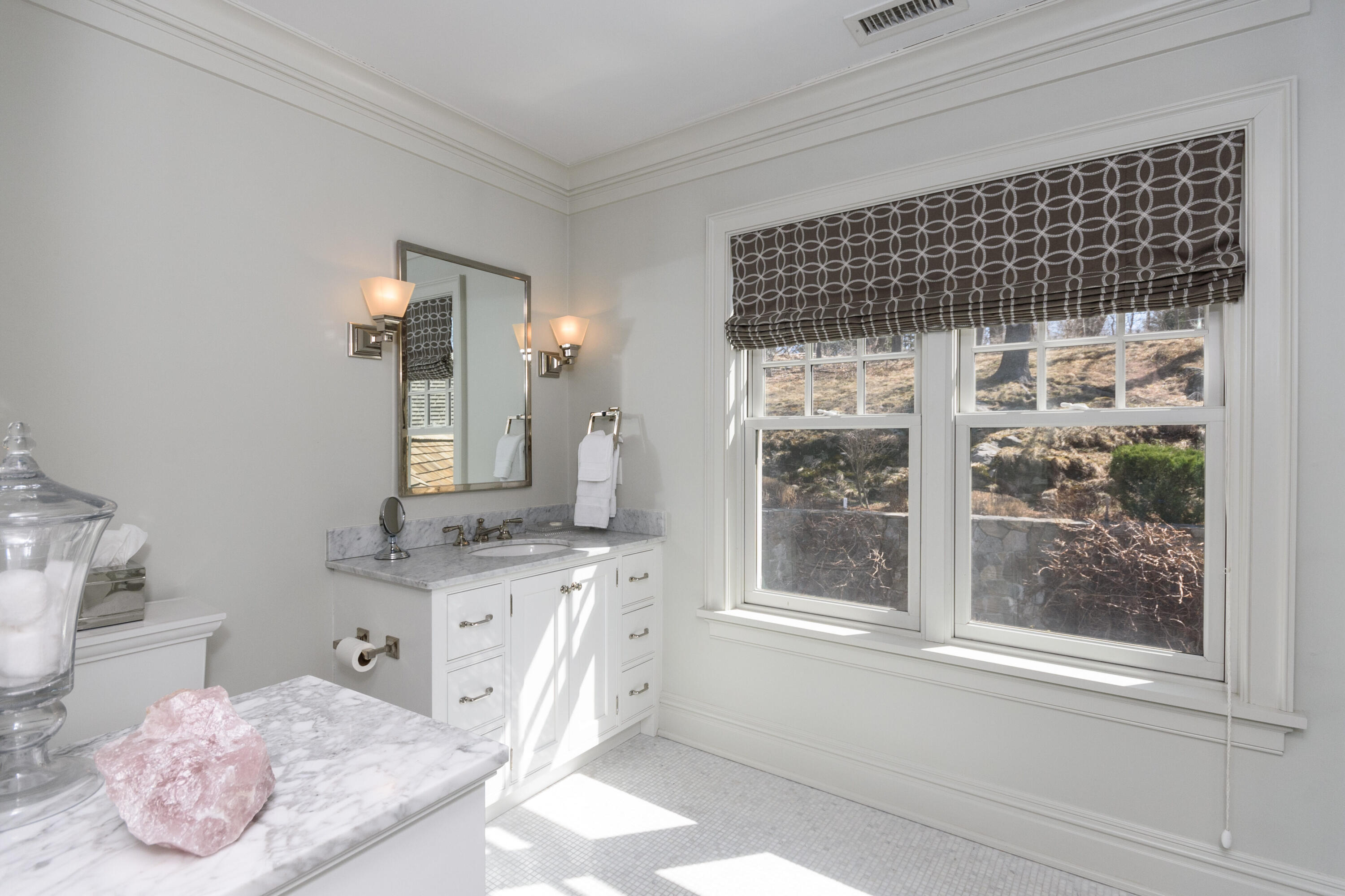 80 Goodwives River Road Darien, CT 06820 - Photo 39 of 57 a bathroom with a granite countertop sink a vanity and a mirror
