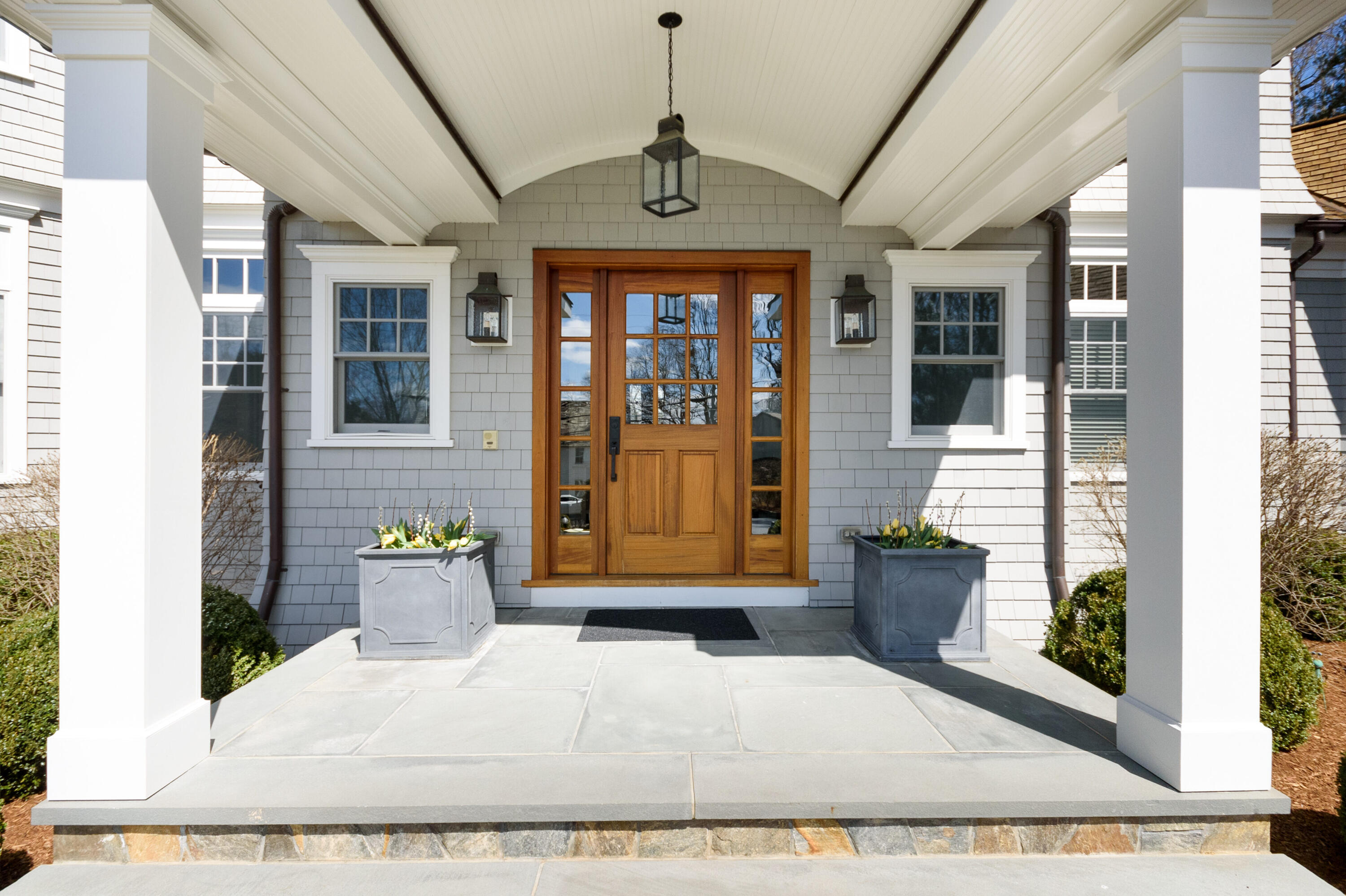 80 Goodwives River Road Darien, CT 06820 - Photo 6 of 57 a front view of a house with a porch