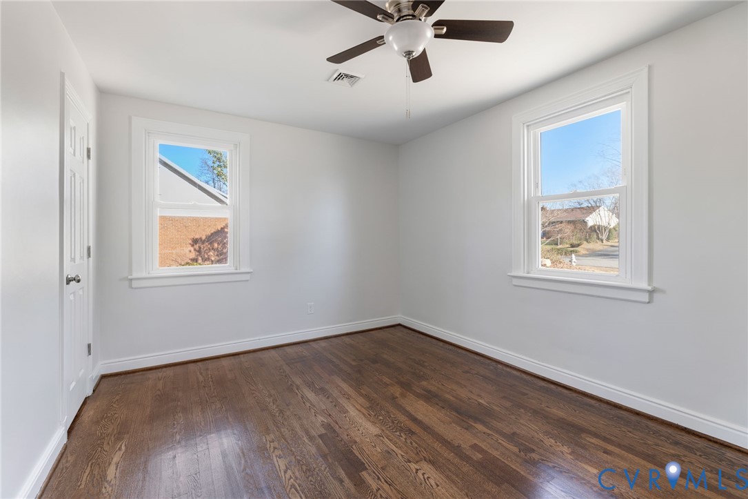 2002 Milbank Road Henrico, VA 23229 - Photo 15 of 23 a view of a big room with wooden floor and windows