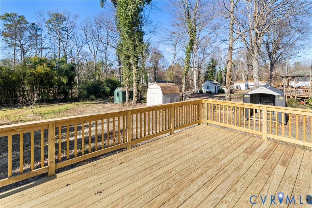 2002 Milbank Road Henrico, VA 23229 - Photo 20 of 23 a view of a balcony with wooden floor and fence