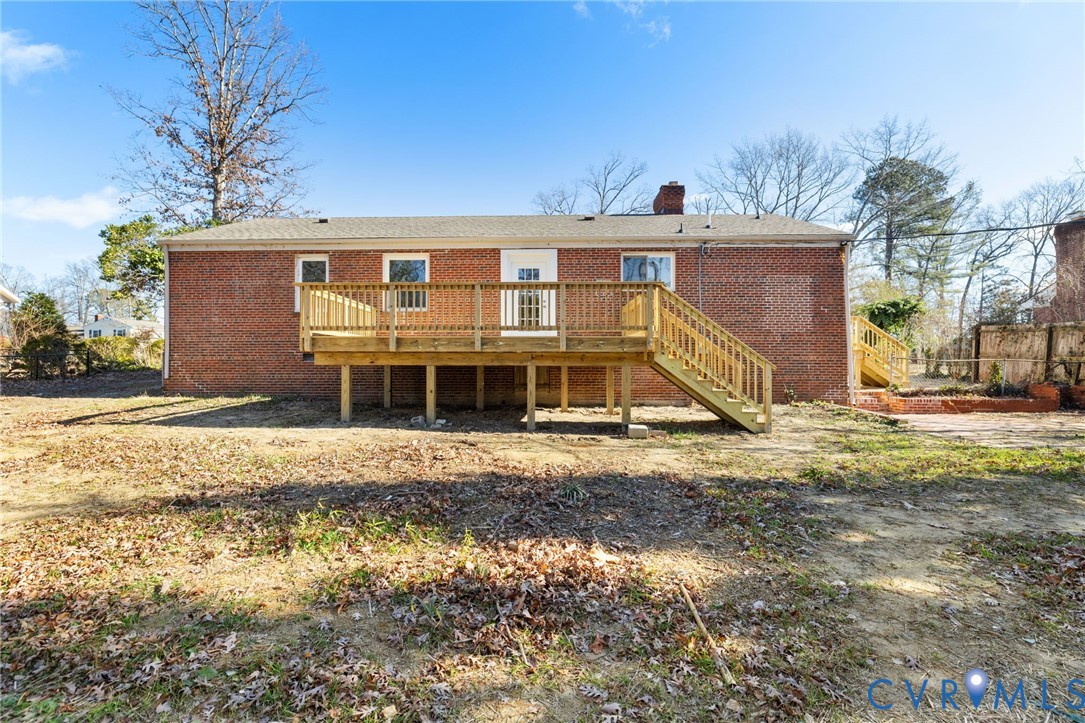 2002 Milbank Road Henrico, VA 23229 - Photo 23 of 23 a view of a house with a yard
